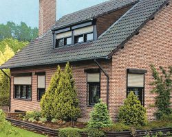 brown frame & beige slats roll shutters installed on brick home