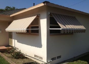 Tan and brown smaller awnings covering windows